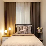 Of Hotell *